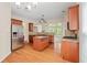 Bright kitchen with granite countertops, center island, and stainless steel appliances at 1125 Harvest Brook Way, Lawrenceville, GA 30043