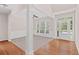 Bright living room with hardwood floors, neutral walls, and natural light at 1125 Harvest Brook Way, Lawrenceville, GA 30043