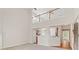 Open-concept living area connects to the kitchen with lots of natural light at 1125 Harvest Brook Way, Lawrenceville, GA 30043