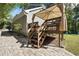 View of outdoor deck with privacy canopy, access from the paver stone patio at 1493 Martin Nash Sw Rd, Lilburn, GA 30047