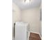 Functional laundry room with modern washer and dryer at 1493 Martin Nash Sw Rd, Lilburn, GA 30047