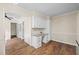 Home office features wood floors, granite countertop and built in cabinets and drawers at 1493 Martin Nash Sw Rd, Lilburn, GA 30047