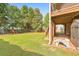 Spacious backyard with lush green grass and an outdoor playset at 1730 Millhouse Run, Marietta, GA 30066