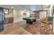Basement game room featuring a pool table, kitchenette, and wood flooring at 1730 Millhouse Run, Marietta, GA 30066