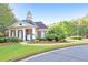 Community clubhouse with manicured landscaping, offering a space for gatherings and events at 1730 Millhouse Run, Marietta, GA 30066