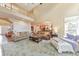 Open-concept living room with plush seating and plenty of natural light at 1730 Millhouse Run, Marietta, GA 30066