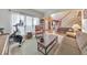 Cozy living room with plenty of natural light and a Peloton bike to burn some calories at home at 1730 Millhouse Run, Marietta, GA 30066