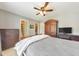 Spacious main bedroom features an ensuite bathroom and walk in closet at 1730 Millhouse Run, Marietta, GA 30066