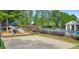 Community amenities including a sparkling pool, basketball court, playground, and lounging areas at 1730 Millhouse Run, Marietta, GA 30066