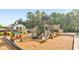 Fun community playground with slides, climbing structures, and playhouse surrounded by lush landscaping at 1730 Millhouse Run, Marietta, GA 30066