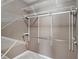 Walk-in closet with custom shelving and chrome hanging rods at 175 Fenwyck Commons, Fayetteville, GA 30214