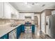 Well-equipped kitchen with stainless steel appliances, granite countertops, and ample storage space at 175 Fenwyck Commons, Fayetteville, GA 30214
