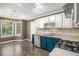 Cozy kitchen with a view to a bay window, granite countertops, and stainless steel appliances at 175 Fenwyck Commons, Fayetteville, GA 30214