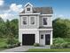 Charming two-story home with a black garage door and landscaped front yard, blending modern design with cozy appeal at 29 Benscot Dr, Austell, GA 30106