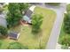 Aerial perspective of the home showing the expansive yard, deck, and storage shed at 701 Rockingham Ct, Woodstock, GA 30189