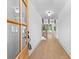 Bright entryway with hardwood floors and a view into the living space, creating an inviting atmosphere at 210 Regester Way, Peachtree City, GA 30269