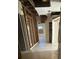 Hallway featuring damaged ceilings and walls, showing the home's need for renovation at 2284 Beecher Sw Cir, Atlanta, GA 30311