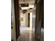 Hallway with damaged ceilings and walls leading to other rooms in the house at 2284 Beecher Sw Cir, Atlanta, GA 30311