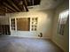 View of living room with damaged ceiling, walls, windows and needed repair at 2284 Beecher Sw Cir, Atlanta, GA 30311