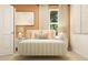 Elegant bedroom with neutral walls, luxurious bedding, bedside tables, and natural light, creating a relaxing space at 2489 Cotton Ln, Douglasville, GA 30135