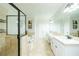 Luxury bathroom with walk-in shower, soaking tub, and dual vanities at 538 Micayne Cir # 3, Smyrna, GA 30082