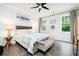Bright bedroom with large windows features a comfortable bed and stylish decor at 538 Micayne Cir # 3, Smyrna, GA 30082