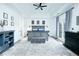 Spacious main bedroom with tray ceilings features a sitting area and ample natural light at 538 Micayne Cir # 3, Smyrna, GA 30082
