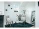 Cozy sitting area with decorative pillows, stylish lamp, and elegant mirror at 538 Micayne Cir # 3, Smyrna, GA 30082