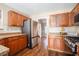 Spacious kitchen featuring stainless steel appliances, ample counter space, and modern cabinetry at 7492 Ferrara Dr, Lithonia, GA 30058