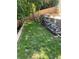 Wide expanse of green lawn is terraced and backed by tall privacy fences at 140 Puckett Creek Dr, Canton, GA 30114