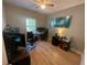 Nicely lit bedroom featuring hardwood floors and a window, perfect for a home office or study at 140 Puckett Creek Dr, Canton, GA 30114
