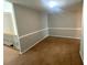 Empty Bonus room featuring carpet flooring and lots of space at 140 Puckett Creek Dr, Canton, GA 30114