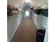 Walk-in closet with built-in shelves and ample storage space at 140 Puckett Creek Dr, Canton, GA 30114