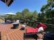 Spacious outdoor deck with wooded views, ideal for relaxation and entertaining at 140 Puckett Creek Dr, Canton, GA 30114