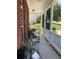 Charming front porch featuring classic rocking chairs, creating a relaxing outdoor space at 140 Puckett Creek Dr, Canton, GA 30114