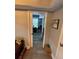 Hallway looking into bedroom with a sliding barn door and ample natural light at 140 Puckett Creek Dr, Canton, GA 30114