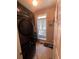 Laundry room featuring a washer/dryer set and a window with natural light at 140 Puckett Creek Dr, Canton, GA 30114