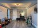 Playroom with neutral walls, vinyl floors and tray ceilings for a warm, inviting space at 140 Puckett Creek Dr, Canton, GA 30114