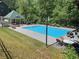This community pool and pavilion offer a refreshing retreat amidst lush greenery at 140 Puckett Creek Dr, Canton, GA 30114