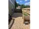 Side yard features a pea gravel ground cover and raised garden bed at 140 Puckett Creek Dr, Canton, GA 30114