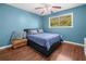 Inviting bedroom with plush bed, wood floors and ample natural light at 1759 Kimberly Sw Dr, Marietta, GA 30008