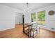 Dining room features neutral colors, a modern chandelier, and a view of the outdoors at 1759 Kimberly Sw Dr, Marietta, GA 30008