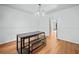 Bright dining room features stylish chandelier lighting and an inviting dining set at 1759 Kimberly Sw Dr, Marietta, GA 30008