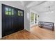 Foyer featuring double doors leading into an open-concept living area at 1759 Kimberly Sw Dr, Marietta, GA 30008
