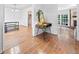Hallway featuring hardwood floors, stylish decor, and open access to various rooms at 1759 Kimberly Sw Dr, Marietta, GA 30008