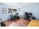 Bright home office with two work stations, large window, ceiling fan and wood floors at 1759 Kimberly Sw Dr, Marietta, GA 30008