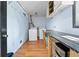Functional laundry room featuring utility sink, countertop workspace, and ample storage at 1759 Kimberly Sw Dr, Marietta, GA 30008