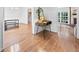 Open-concept living area with hardwood floors, and dining area to the left at 1759 Kimberly Sw Dr, Marietta, GA 30008