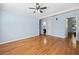 Spacious main bedroom featuring hardwood floors, ensuite bathroom, and ample closet space, offering comfort and privacy at 1759 Kimberly Sw Dr, Marietta, GA 30008