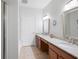 Bathroom featuring double vanity with granite countertop and modern fixtures at 1975 Nocturne Dr # 2303, Alpharetta, GA 30009